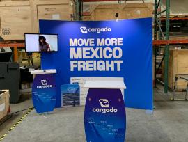 RENTAL: RE-1094 Inline Design with SYM-501 Symphony Curved Backwall with Baseplates, SYM-401 Backwall Workstation with Wireless Charging Ports, Monitor Mount, RE-1255 Reception Counter, (2) LED Arm Lights